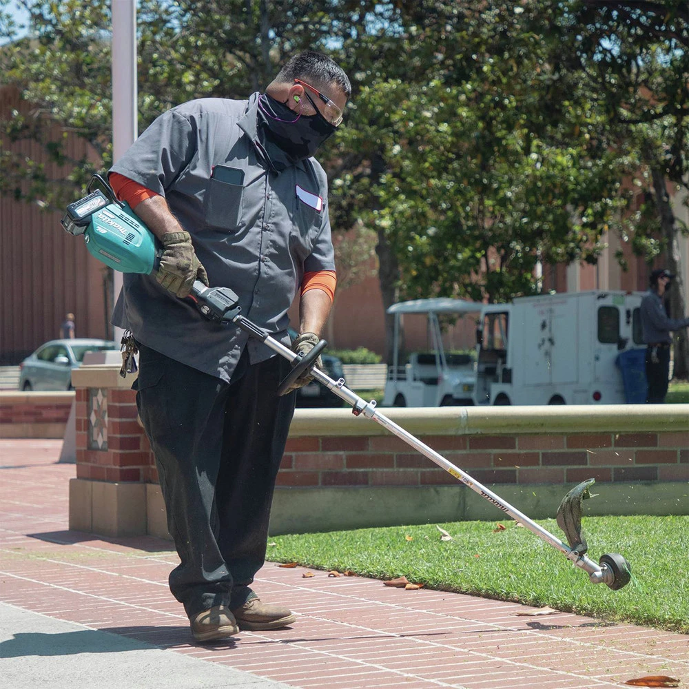 Makita GUX01JM1X1 40V Max XGT Brushless Lithium-Ion Cordless Couple Shaft Power Head With 17 In. String Trimmer Attachment Kit (4 Ah) 9 Makita GUX01JM1X1 40V Max XGT Brushless Lithium-Ion Cordless Couple Shaft Power Head With 17 In. String Trimmer Attachment Kit (4 Ah) - Image 7