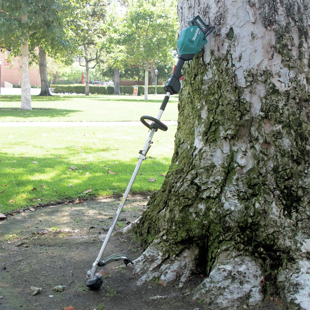 Makita GUX01JM1X1 40V Max XGT Brushless Lithium-Ion Cordless Couple Shaft Power Head With 17 In. String Trimmer Attachment Kit (4 Ah) 11 Makita GUX01JM1X1 40V Max XGT Brushless Lithium-Ion Cordless Couple Shaft Power Head With 17 In. String Trimmer Attachment Kit (4 Ah) - Image 9