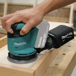 Makita XOB01Z-BL1840DC1 18V LXT Lithium-Ion 5 In. Cordless Random Orbit Sander And Battery With Charger Starter Pack Bundle (4 Ah) 34 Makita XOB01Z-BL1840DC1 18V LXT Lithium-Ion 5 In. Cordless Random Orbit Sander And Battery With Charger Starter Pack Bundle (4 Ah) -Cheap Makita Store mktnxob01z bl1840bdc1 bndl n