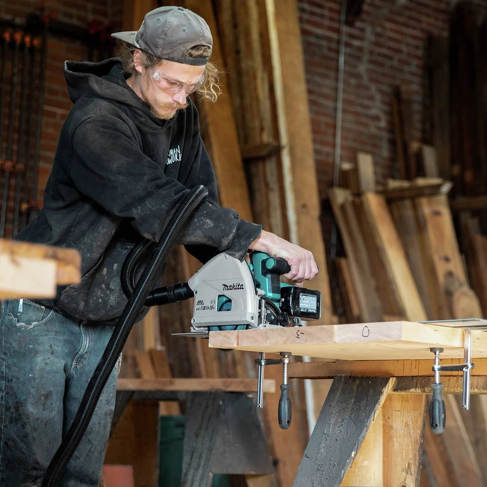 Makita XPS01PMJ-194368-5 18V X2 (36V) LXT Brushless Lithium-Ion 6-1/2 In. Cordless Plunge Circular Saw Kit With 2 Batteries (4 Ah) And 55 In. Guide Rail 25 Makita XPS01PMJ-194368-5 18V X2 (36V) LXT Brushless Lithium-Ion 6-1/2 In. Cordless Plunge Circular Saw Kit With 2 Batteries (4 Ah) And 55 In. Guide Rail - Image 23